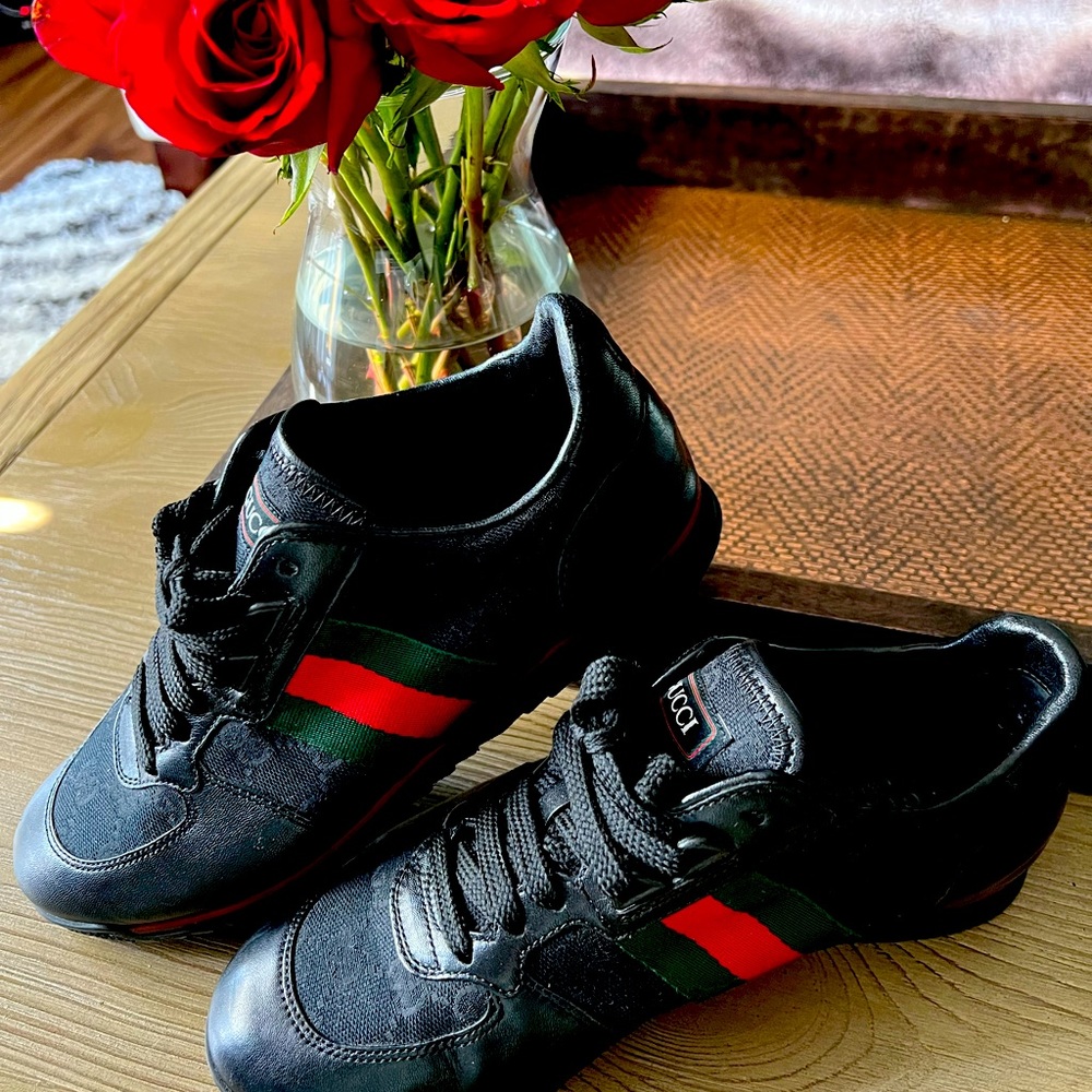 Black and red Gucci sneakers great condition